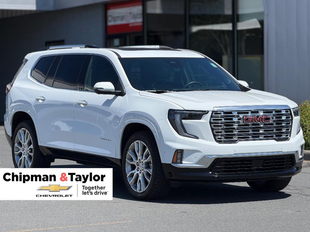 2025 GMC Acadia Denali in Summit White — front three-quarter view