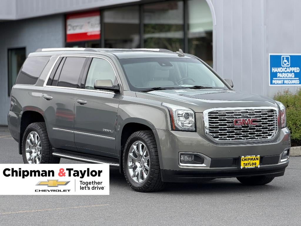 2018 GMC Yukon Denali in Mineral Metallic — front three-quarter view